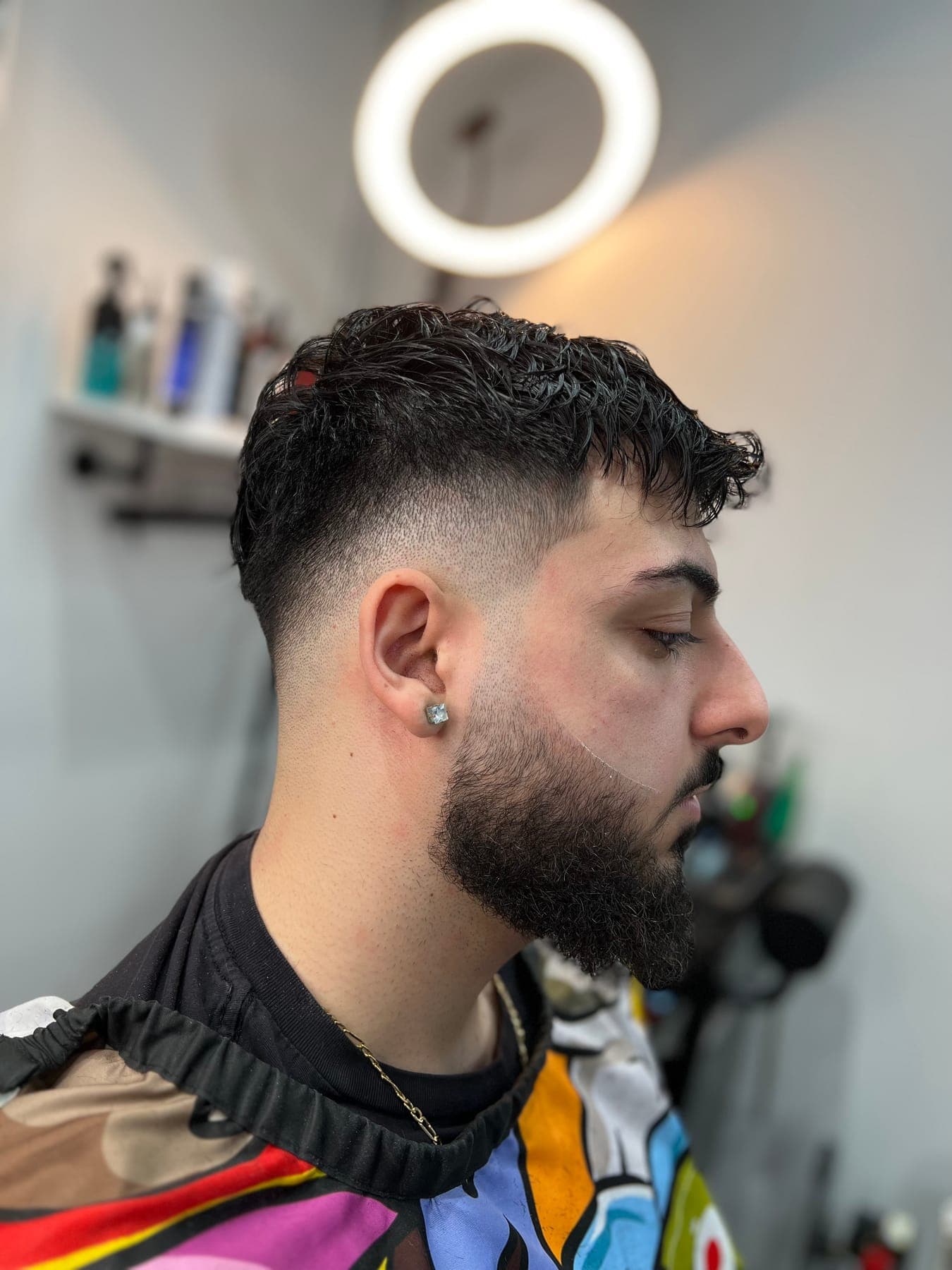 High skin fade with a full beard